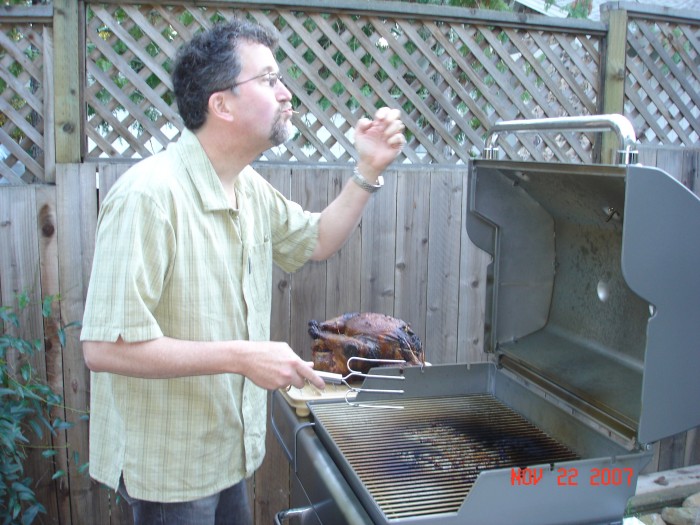 The first taste of the turkey Mark cooked on his new barbie.