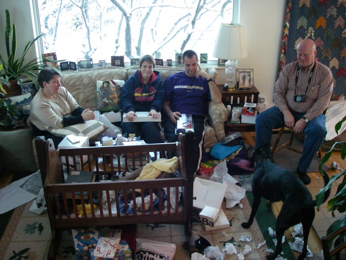 The unwrapping of the presents.  Steve built the cradle, and carried it out from StL.