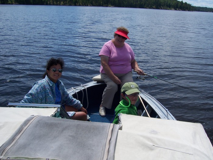 Aunt Pat and Carrie working on walleyes for dinner.