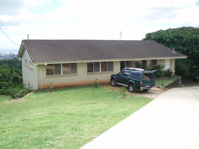 The house has two storeys, one set in below, heaps of room, vintage 60's decor.