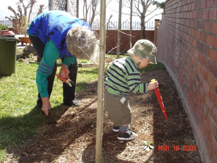 At work in the garden on our return home.  Lots of good help!