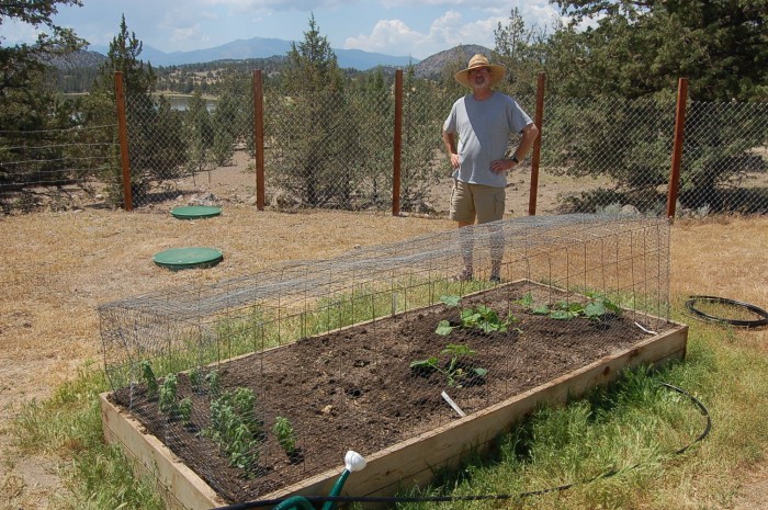 Me and the squash and basil.  The hat proves that I am not &quot;going native&quot;.