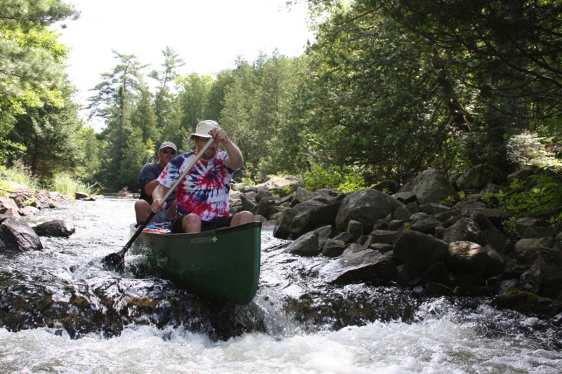 Jon took his canoe through one of the portage-rapids... then we hike back up we both ran um while Jordan took pictures