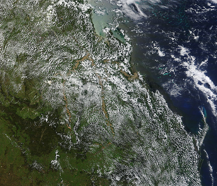 For some reason there seems to be less cloud over the floodwaters, i guess it must be some kind of convective phenomenon.  Rockhampton and the Fitzroy River mouth is more or less in the middle of the picture, 3rd Jan 2011