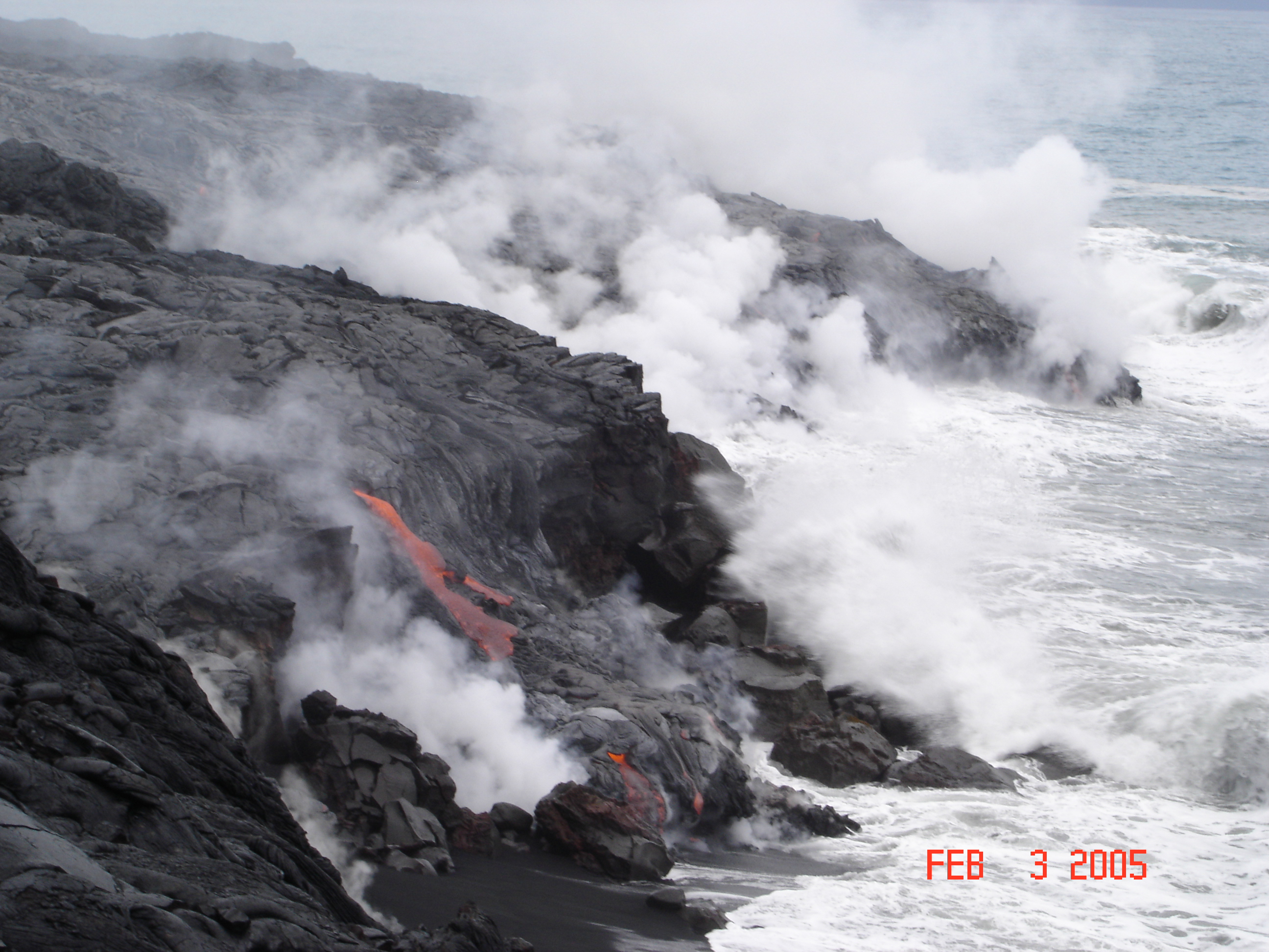 Here's the lava gioing into the sea.  It started up again just the day before we planned to go see Frank and the Volcano Park.