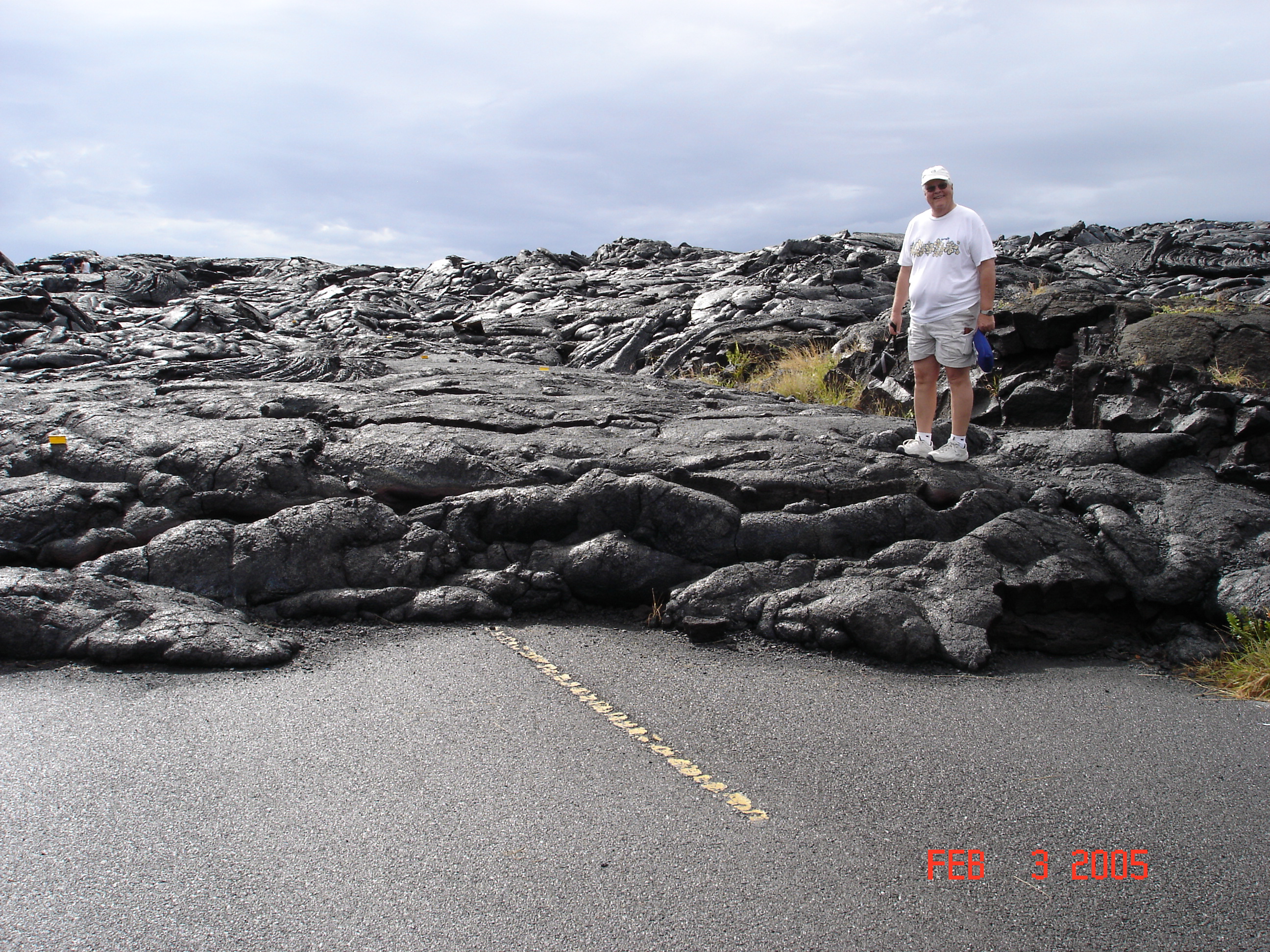 We walked out to where the recent lava flows were going into the sea.  On the way we saw how the lava covered the road.