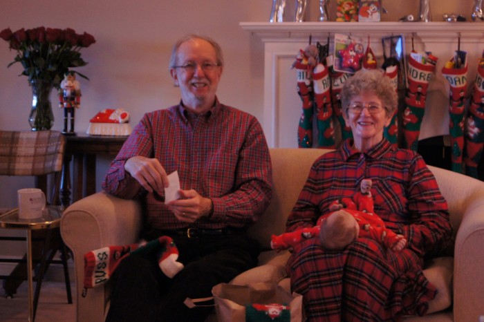 Dad and Mom going through Stockings on Christmas Morning