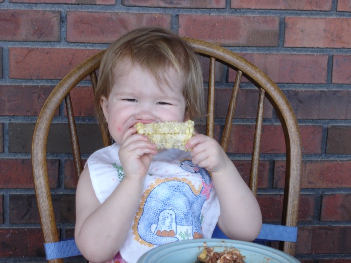 Amanda loved the corn, now that she has teeth.