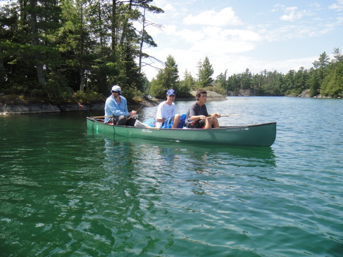 Jason paddled with Steven and Andy and made good time in their 3-boat. This was the last day just as we left the lunch spot. Water was really nice for swimming this year and we spent a lot of time cooling off, jumping from the rocks and enjoying the clear water of the lake