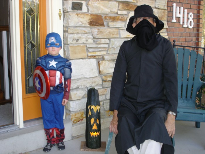 Steven, the 17 pound zucchinni, and a &quot;Darth Vader&quot; looking guy.