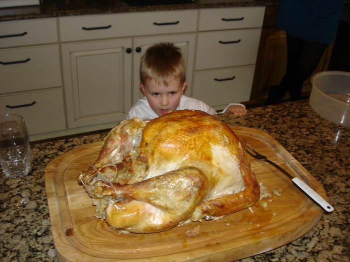 Steven impressed by an awesome 20 pound turkey (guarenteed plenty of left-overs.)