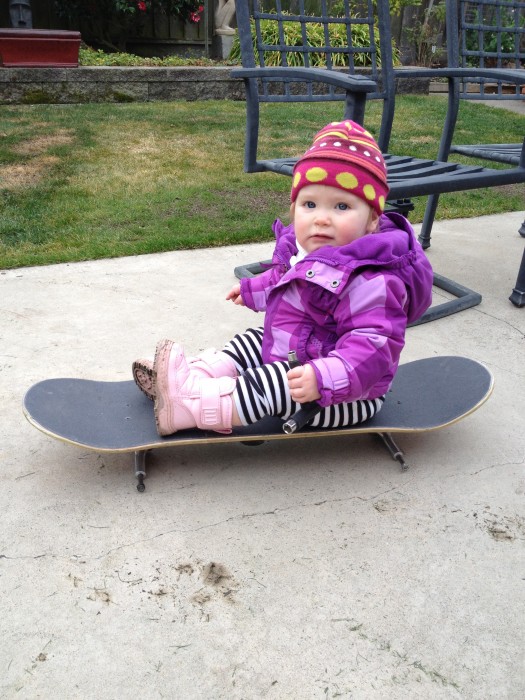 Helping to set up her skateboard