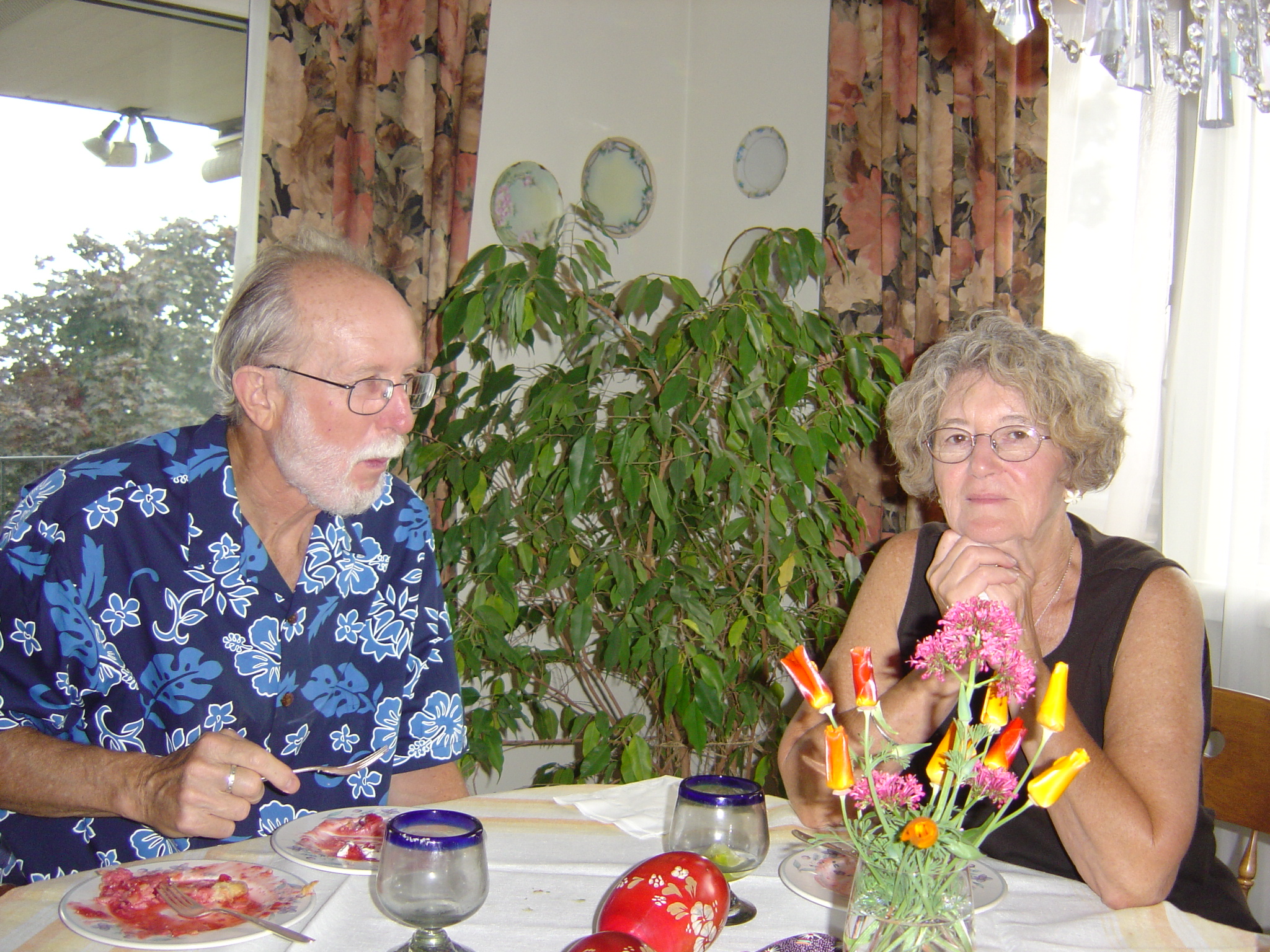 Mom and Dad eating pie on fiesta night