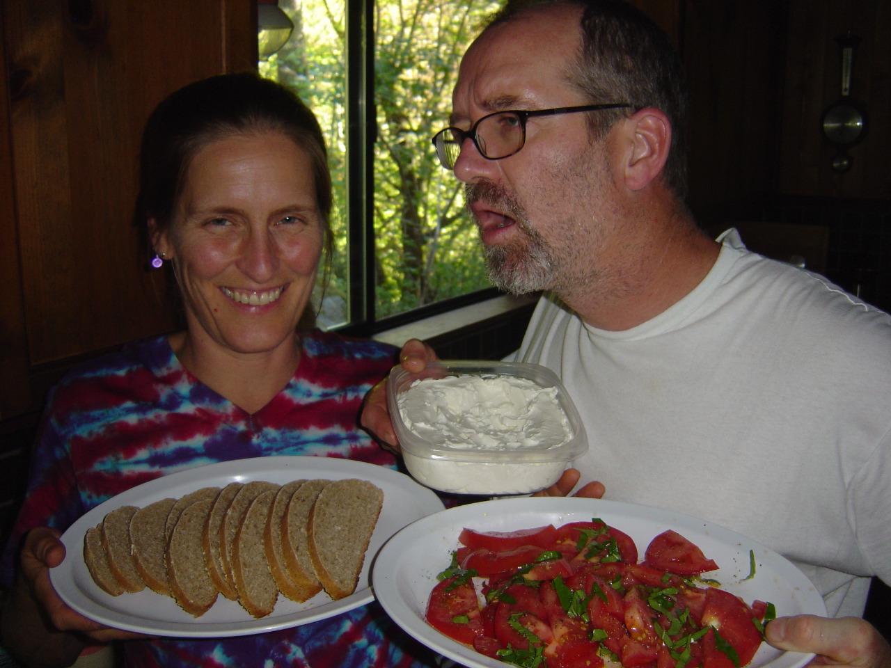 and appetizers with fresh baked bread and homemade goat cheese