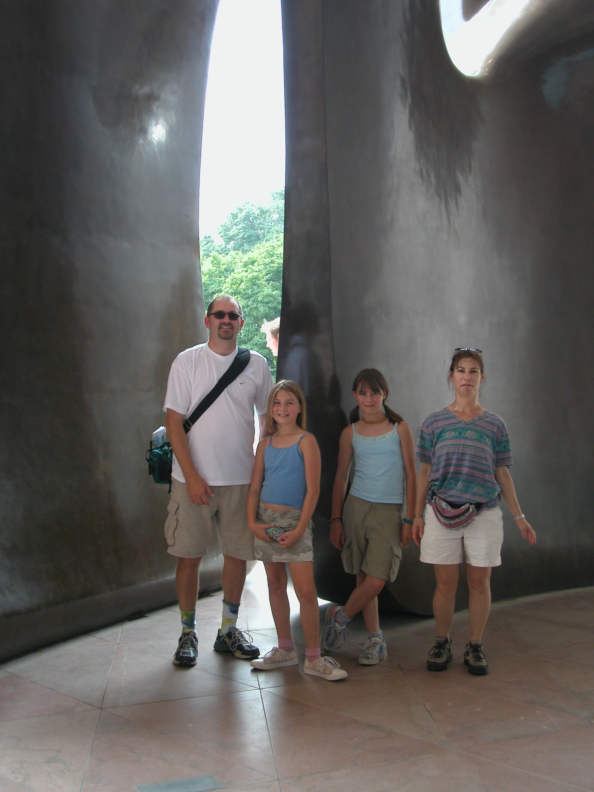 D, D, M, &amp; D posing with a Moore sulpture in front of the East building of the national gallery