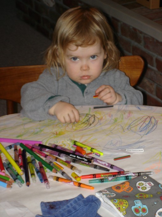 Mathilda with crayons.