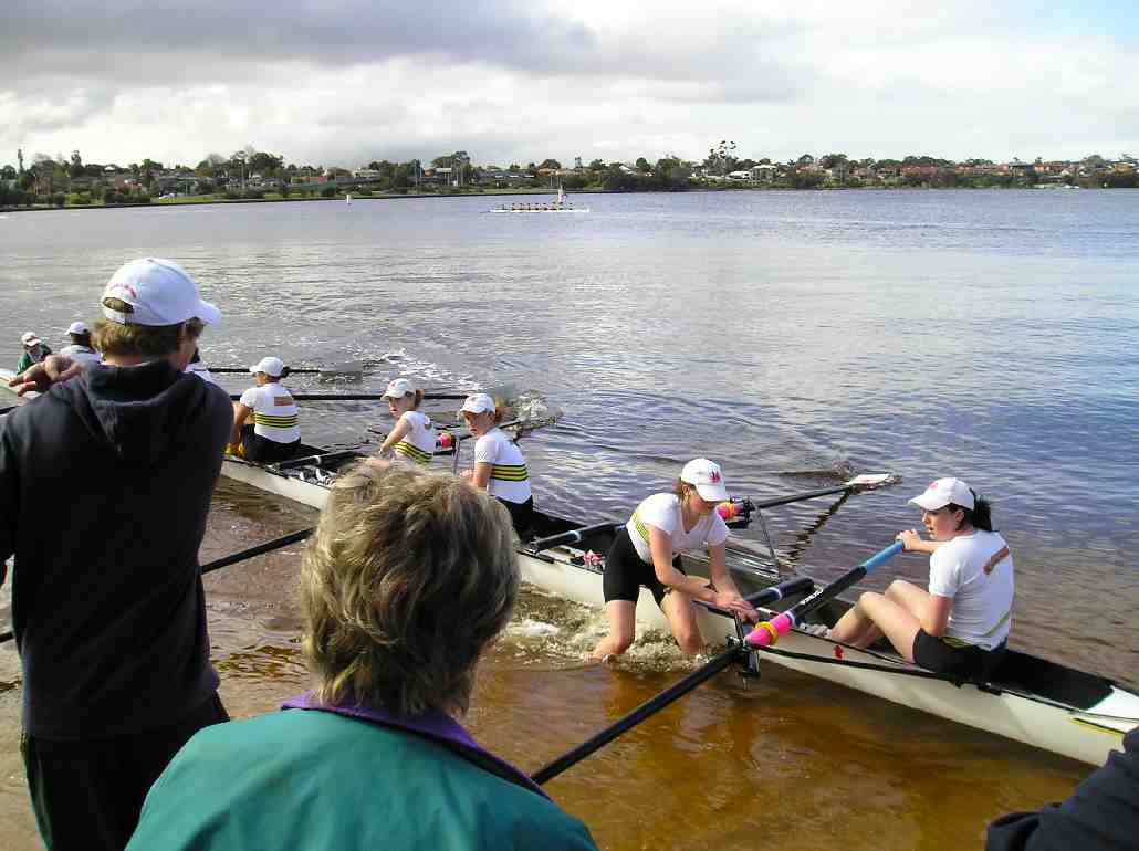 When thte crew got back to shore, noone was sure what had happened, the girls thought they had lost because the other boat was going mental thinking they had won.  You can see katie here hopping out to stop her boat.