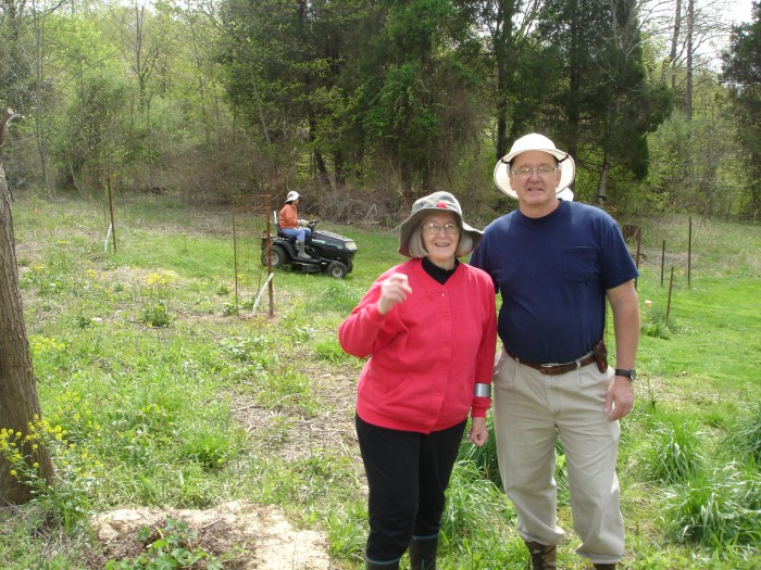 Judy and Jon in the &quot;orchard.&quot;  &quot;BTM&quot; in the background.