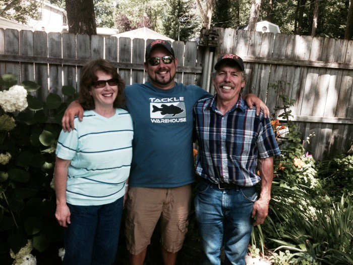 Russ Deb and Curtis in their back yard