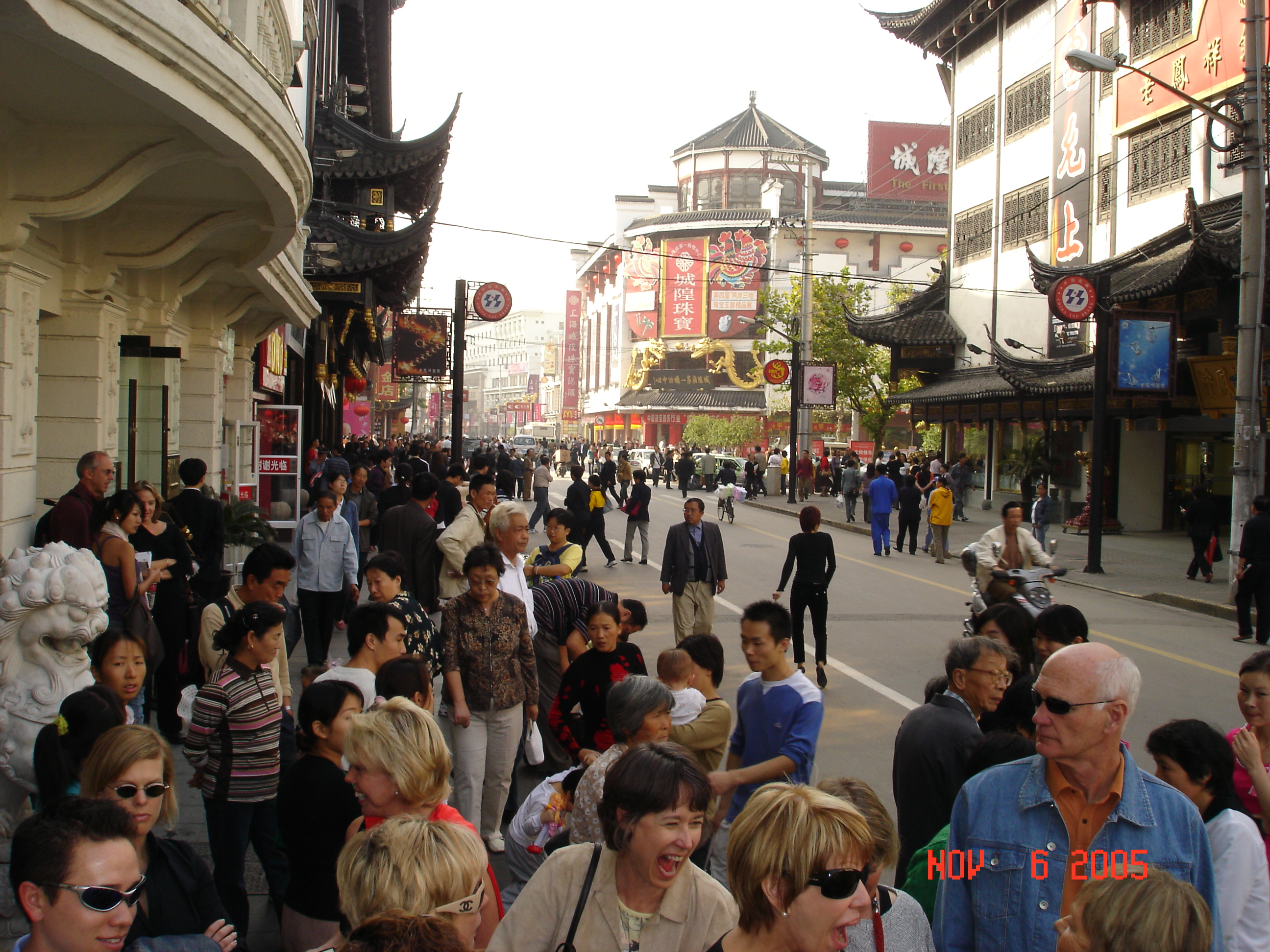 Our group were intense shoppers.  One bought two full size Terra Cotta Warriors, they bought lots of jade buddas and Fu Dogs, shirts jewelry, and pictures.  We were conservative - we already have too much Stuff!  This is a street scene in Shanghi.  We fel