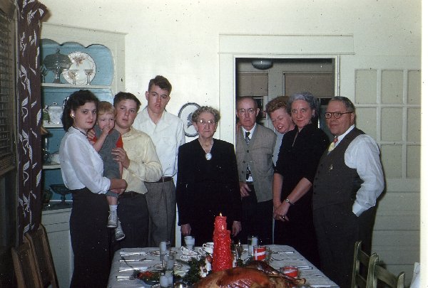 Finally, a picture of Christmas Past, 1948 in fact!  Present are Helen Carleson (before she married Emory), Jeanie, Rusty (me!), Dave, Grandma Pearl Babcock, my Dad's Mom, Grampa Andy Bright, Mom's Dad, Mom, Jean Utley (Lehman), and Web Pratt, a distant c