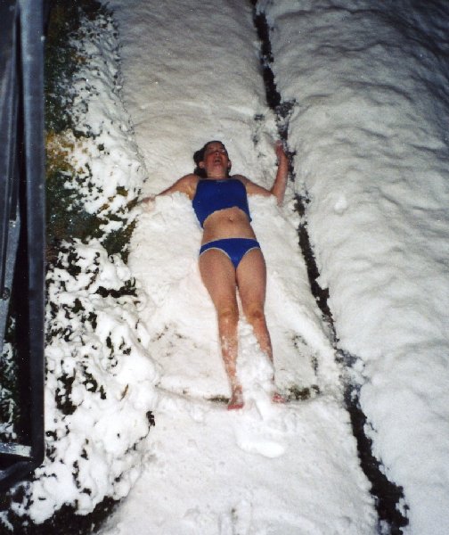 Out of the hot tub and into the snow!  An Angel making a snow Angel!