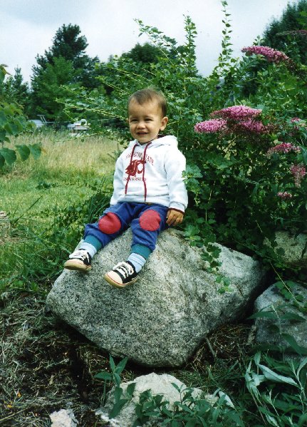 A year old and already helping Dad in the garden, just like now!