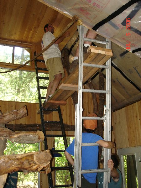 The Brothers helped put up the knotty pine ceiling in C &amp; A's cabin.  Well done, boys!