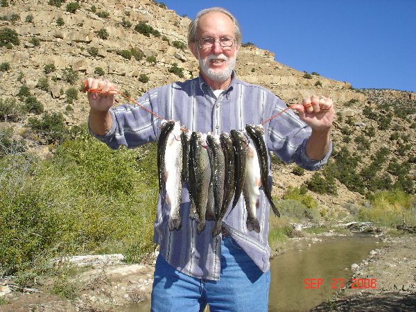 The next day we did a little better!  Rainbows and one big tiger trout.  We had a family fish fry when we got home!